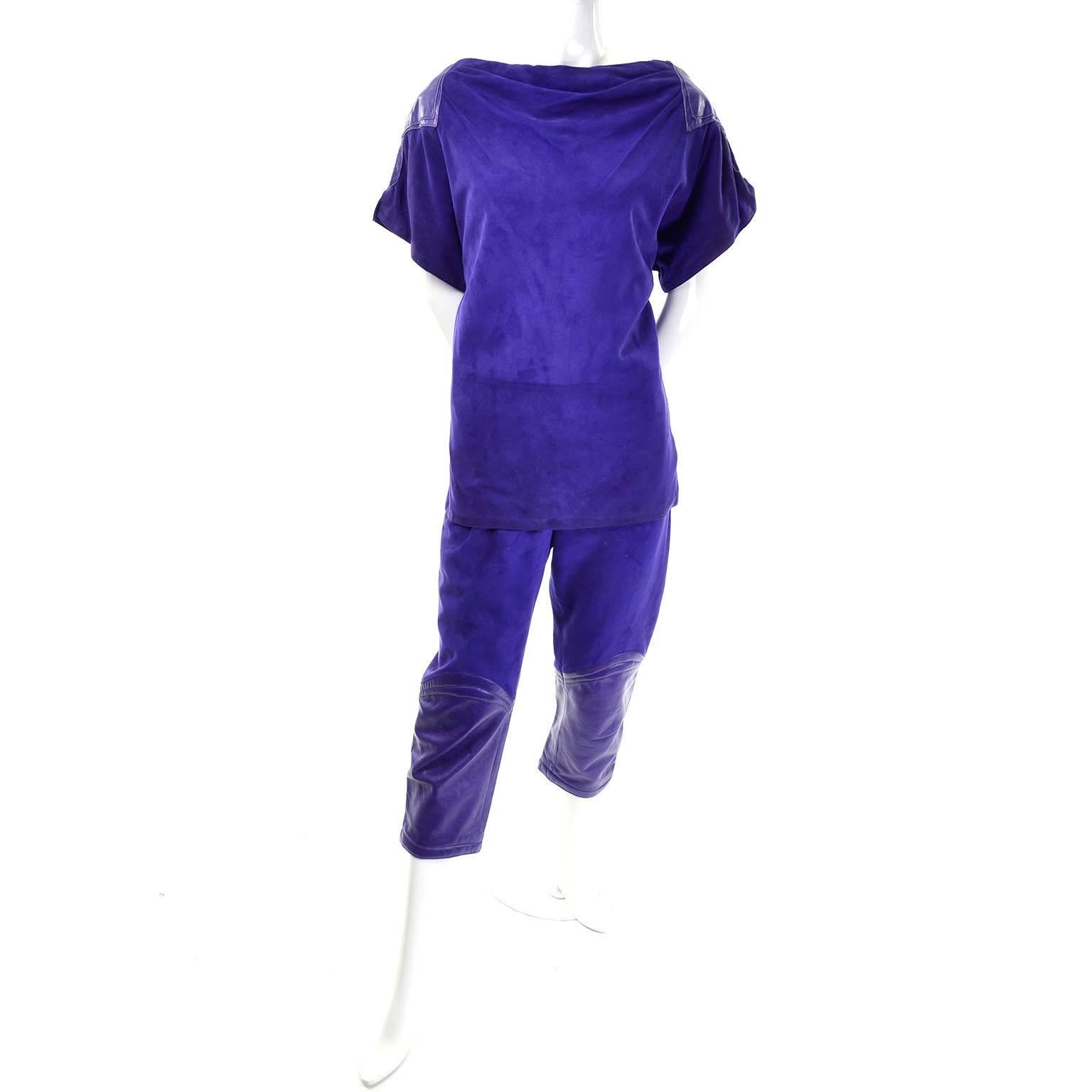 This deep purple lambswool suede top and pants outfit was designed by Claude Montana for Ideal Cuir in the late 1970's. This ensemble has matching purple leather on the calves, almost like extended knee pads, as well as in large triangles on the