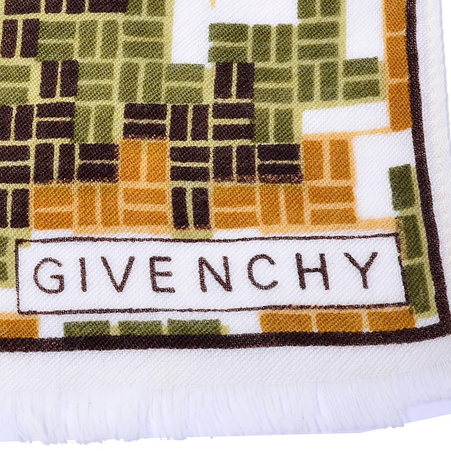 This is a beautiful fine lightweight wool scarf from Givenchy. This scarf came from an exceptional estate of nothing but the very finest designer clothing. This scarf is from the 1970s and measures 14