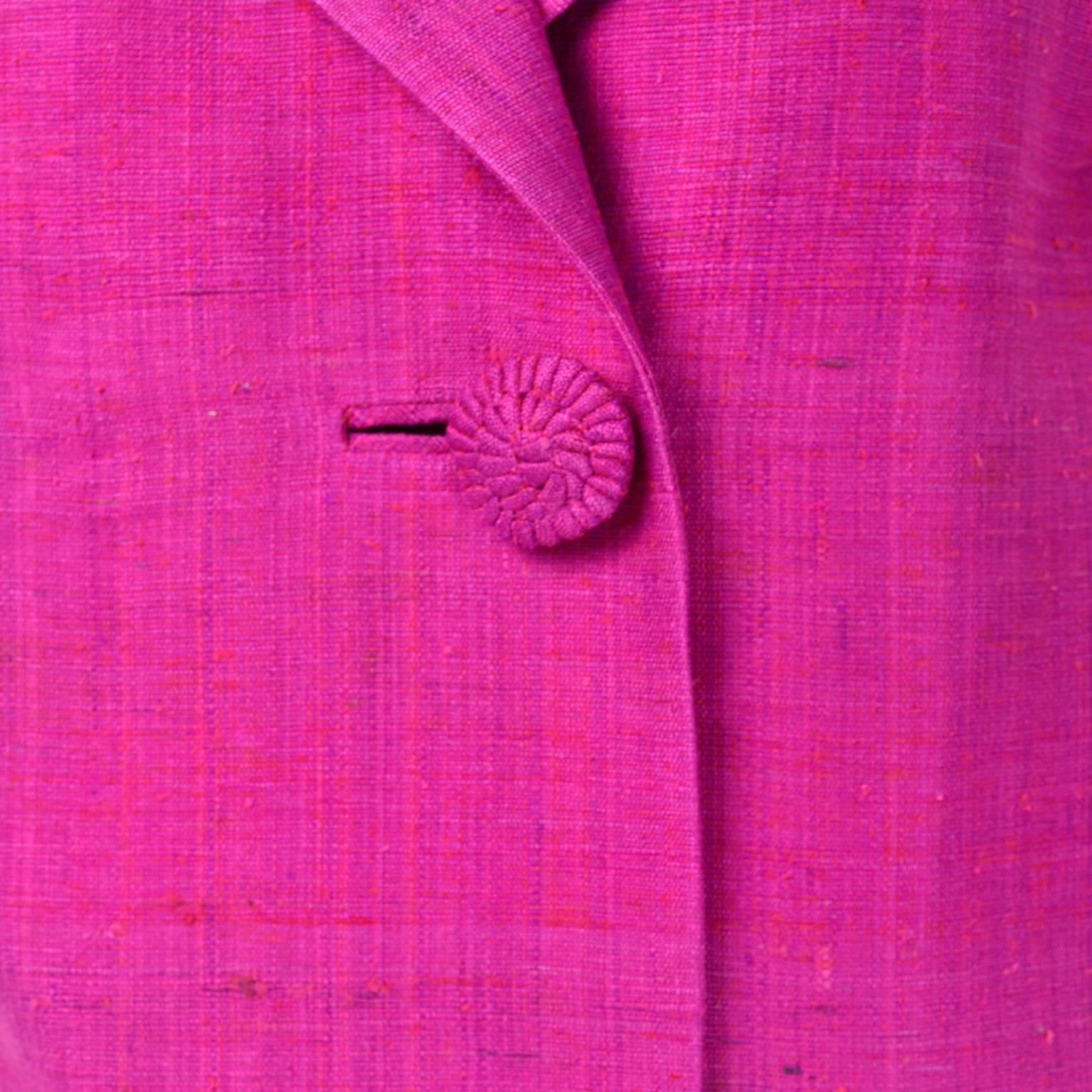 This lovely pink Haz’ls Exclusive silk coat was made in Hong Kong in the 1960's. There are three large woven buttons down the front and the coat is fully lined in pink silk. The sleeves are slightly cropped and the coat is cut in the classic 60's