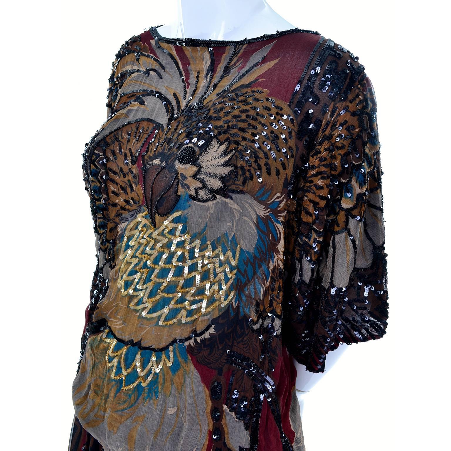 This is an exquisite silk 2 piece ensemble from Adolfo with a gorgeous top with beads and sequins with the images of an eagle and feathers on both the front and the back.  This ensemble is a perfect example of how to mix patterns properly, with the