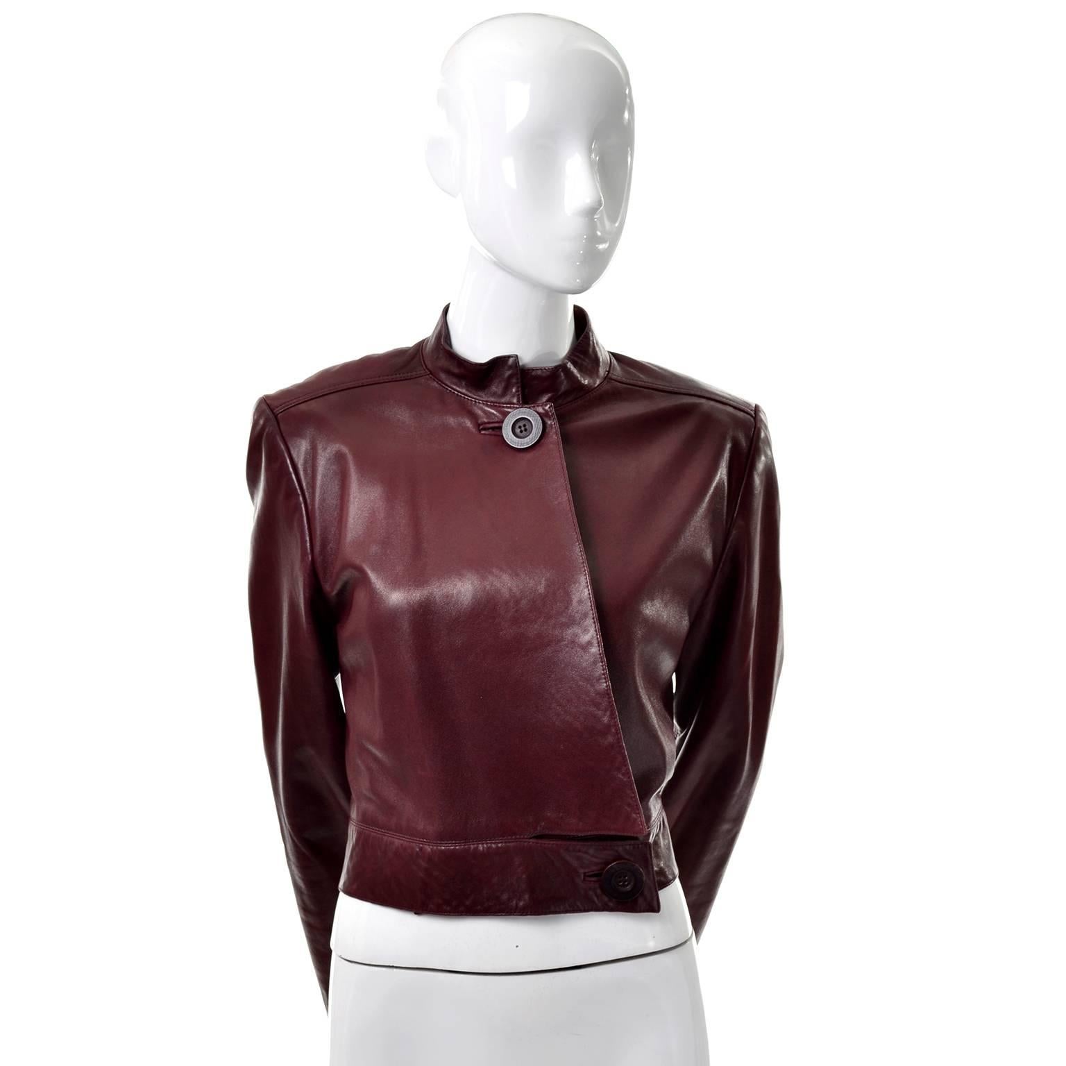 This is a buttery soft vintage cropped cordovan lambskin leather jacket from Geoffrey Beene. The jacket has a mandarin collar and buttons in the front and we love the center pleat in the back.  This jacket was purchased at Neiman Marcus in the early