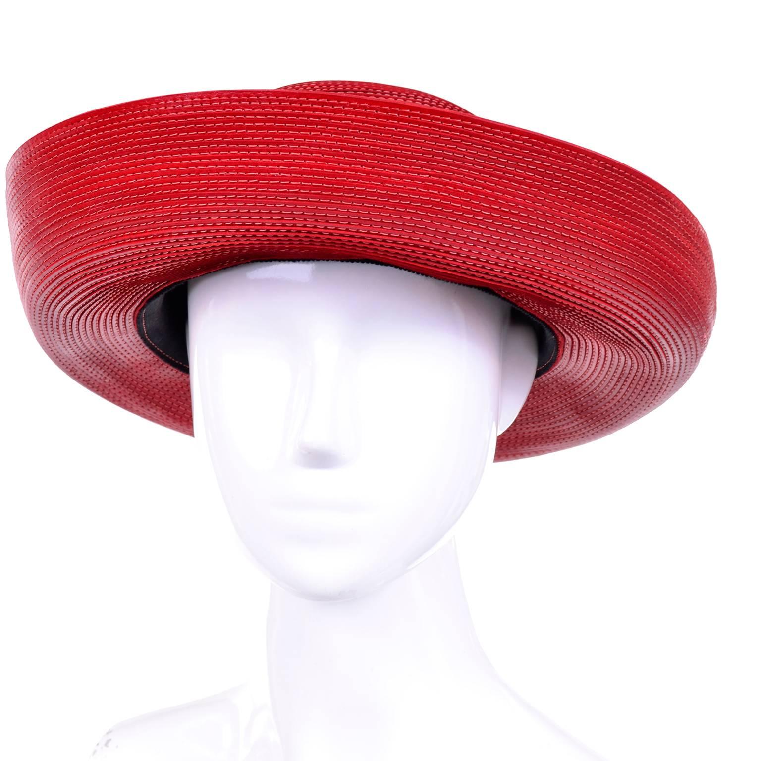 This is an absolutely gorgeous red leather vintage Patricia Underwood hat with rows and rows of micro top stitching. This fabulous hat has a 4