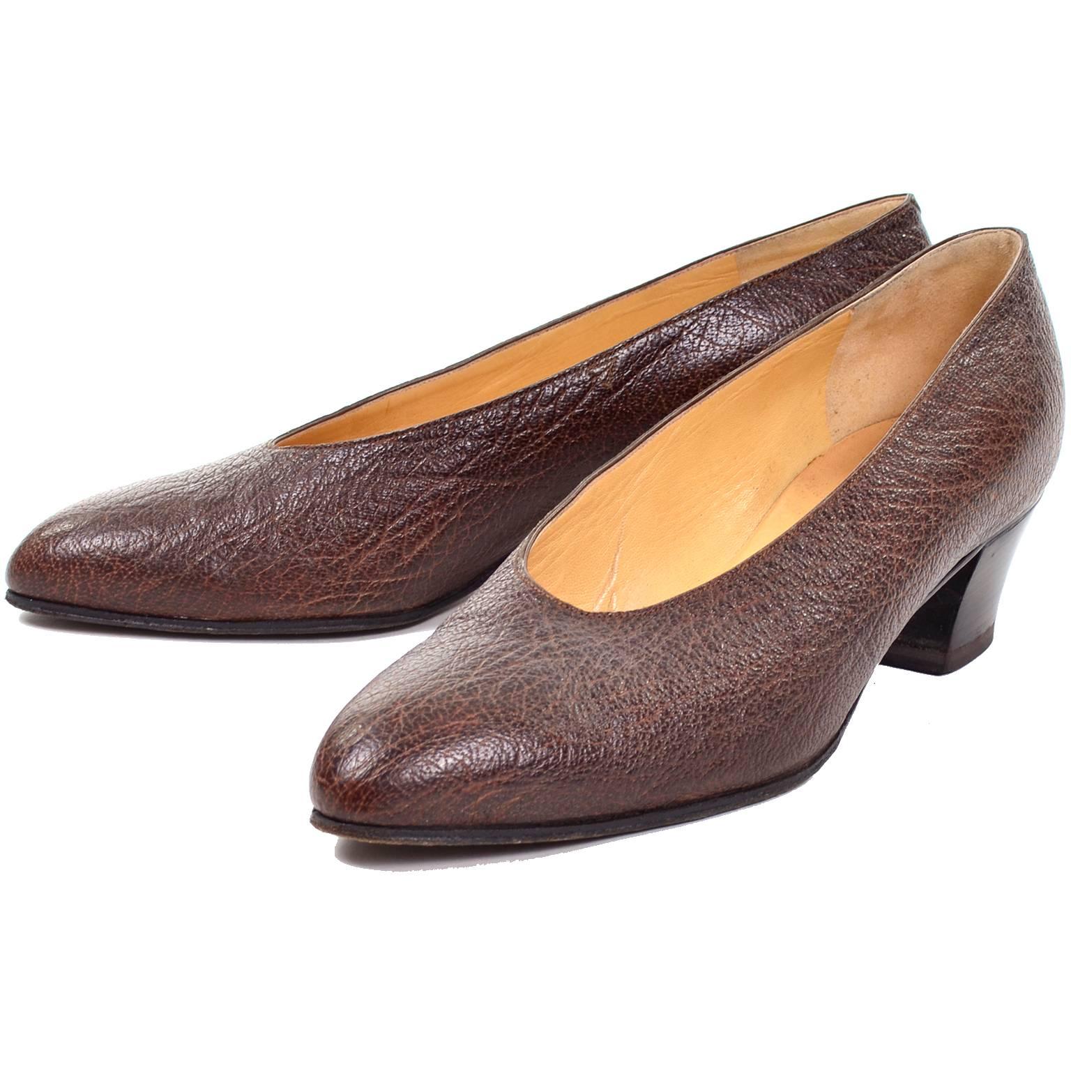 These classic vintage pumps from Hermes are from one of our all time favorite estates of vintage clothing.  The woman who owned these owned many important pieces by the most important designers from the 1950's through the 1970's. These brown