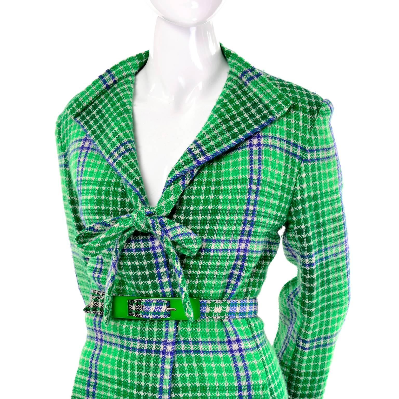 This is a rare 1970's vintage skirt suit from Missoni.  The suit includes a jacket that closes with a single hook with a fabric tie at the neck and a belt with a great buckle and a skirt with an elastic waist that slips overhead.  Both pieces are