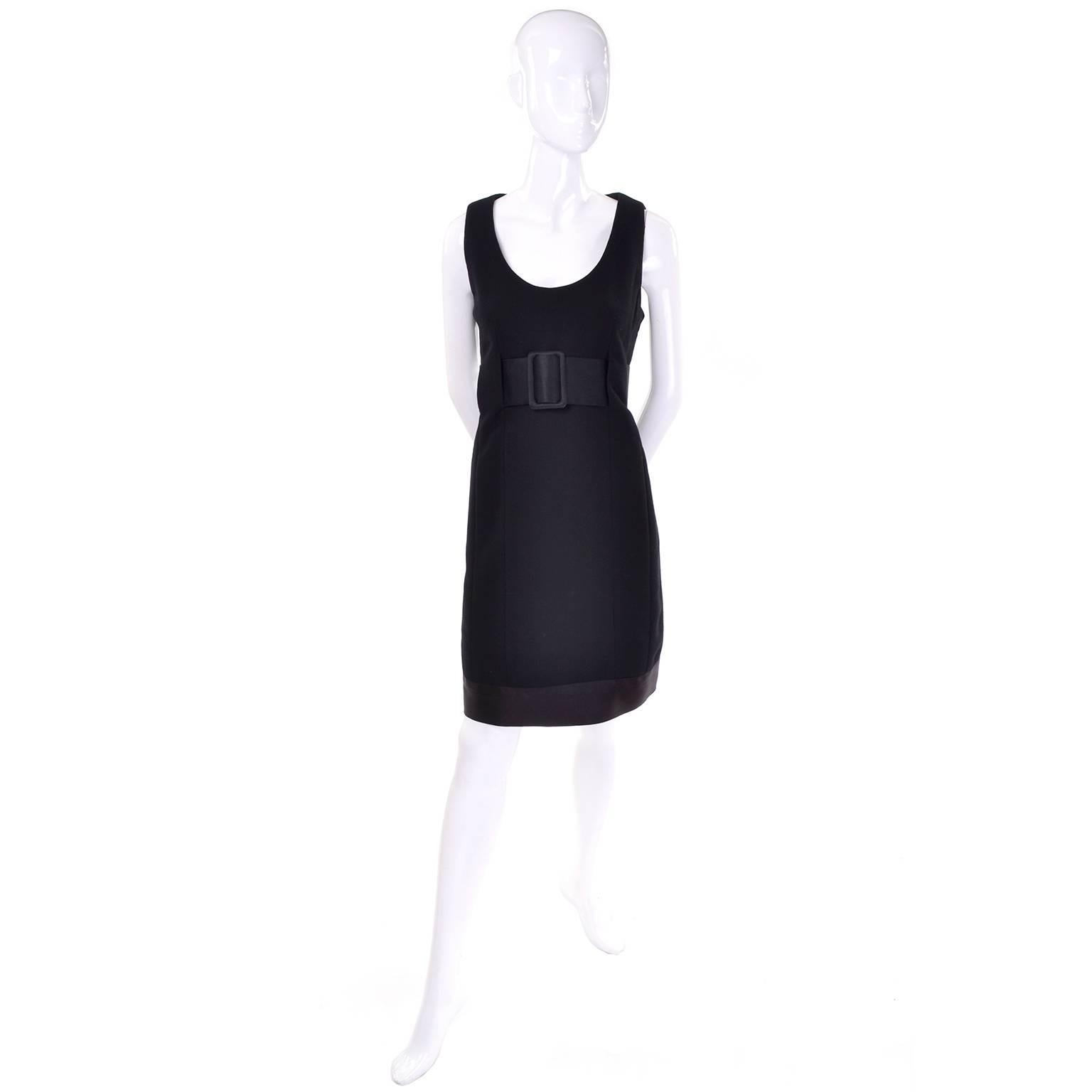This is such an incredible vintage little black wool crepe dress designed in the 1960's by Geoffrey Beene! The dress is fully lined and has a fabulous 3