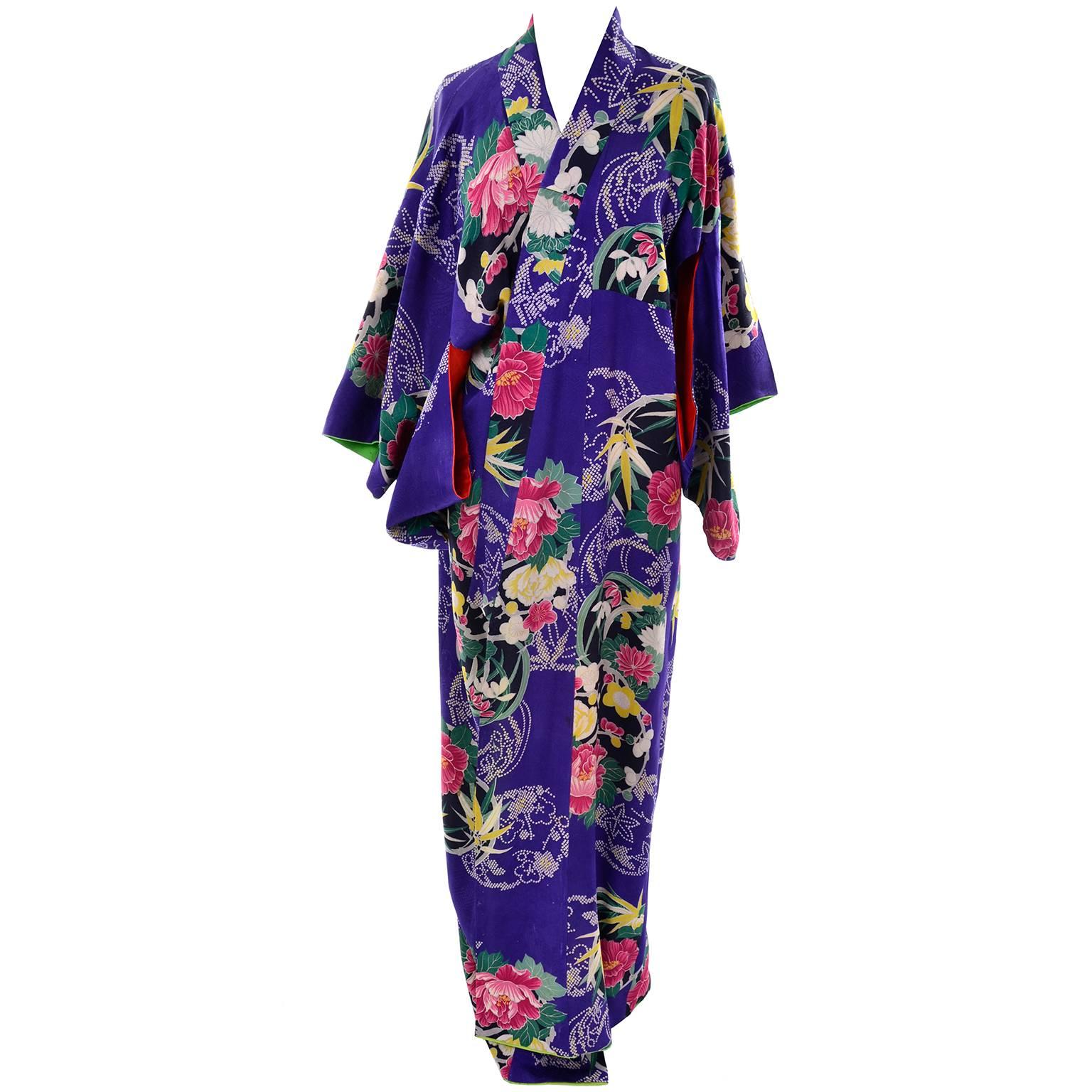 This beautiful royal blue floral silk kimono is from an estate of Asian textiles and clothing we acquired a while back. This kimono has wonderful flowers and leaves in the silk print and really gorgeous silk lining. The robe measures 58