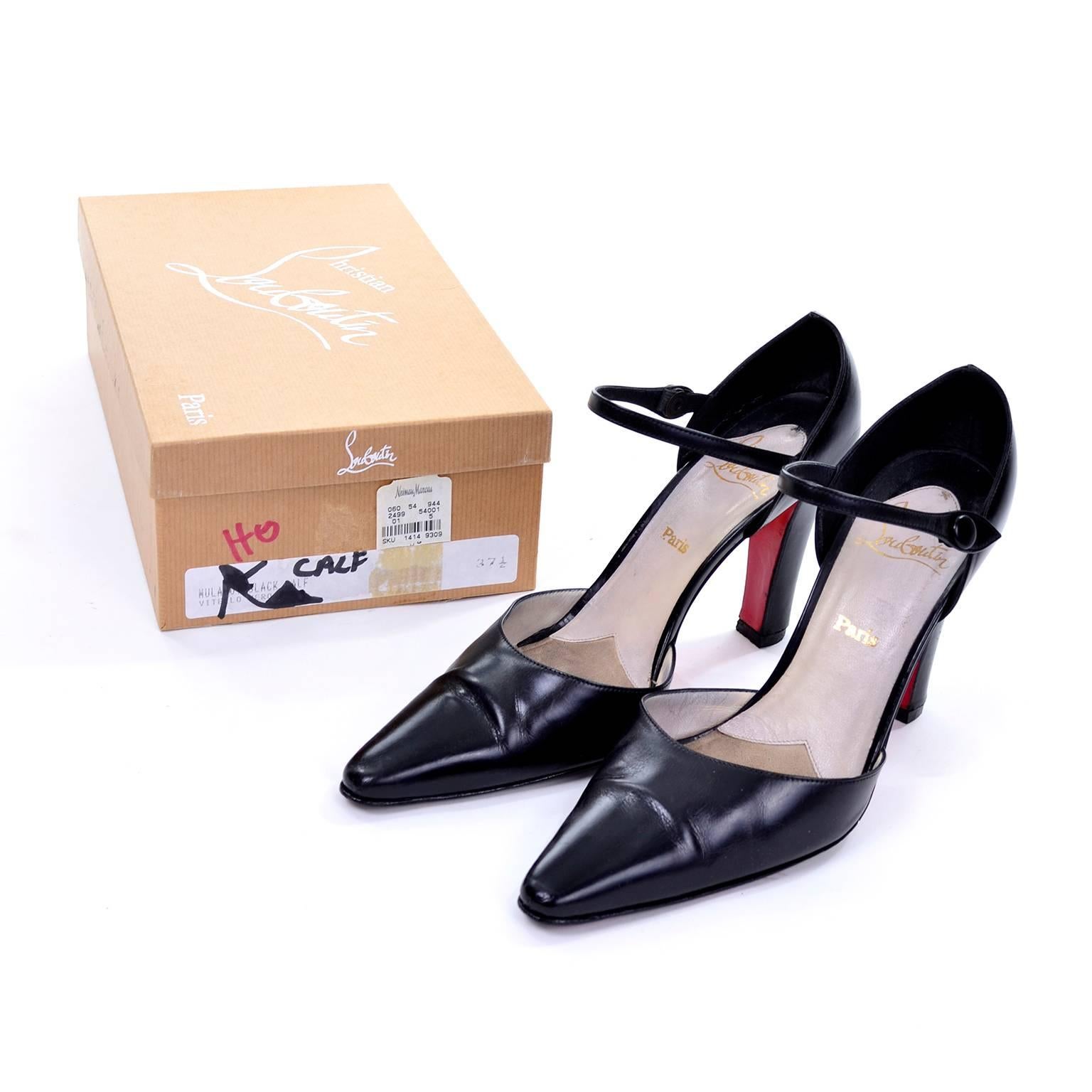We love these Christian Louboutin vintage Mulano black calf leather pumps with the iconic red sole! They have chunky tall heels and a fun pointed top on the back of the heel. These heels have an ankle strap that snaps on one side and a slightly
