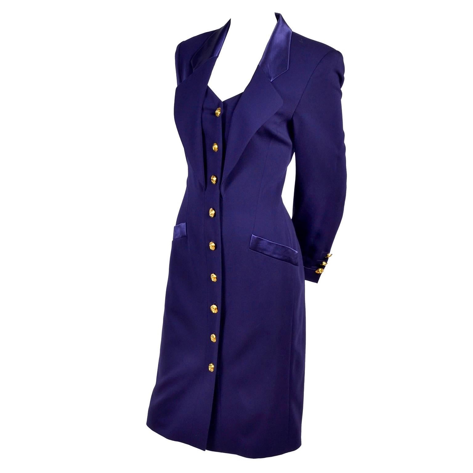 This is a stunning dead stock 1980's Escada Margaretha Ley purple wool vintage dress with decorative lapels and satin details that give it the look of a tuxedo. Gold swirl buttons down the front, and fully lined in silk. Made in Germany and it still