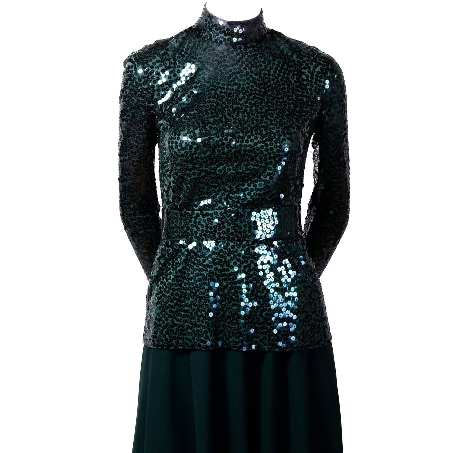 We are very pleased to offer this  vintage Norman Norell Evening ensemble. This is a 2 piece evening dress with a green knit skirt and a gorgeous green sequin covered long sleeved top with a green sequin belt.   Please scroll down and press