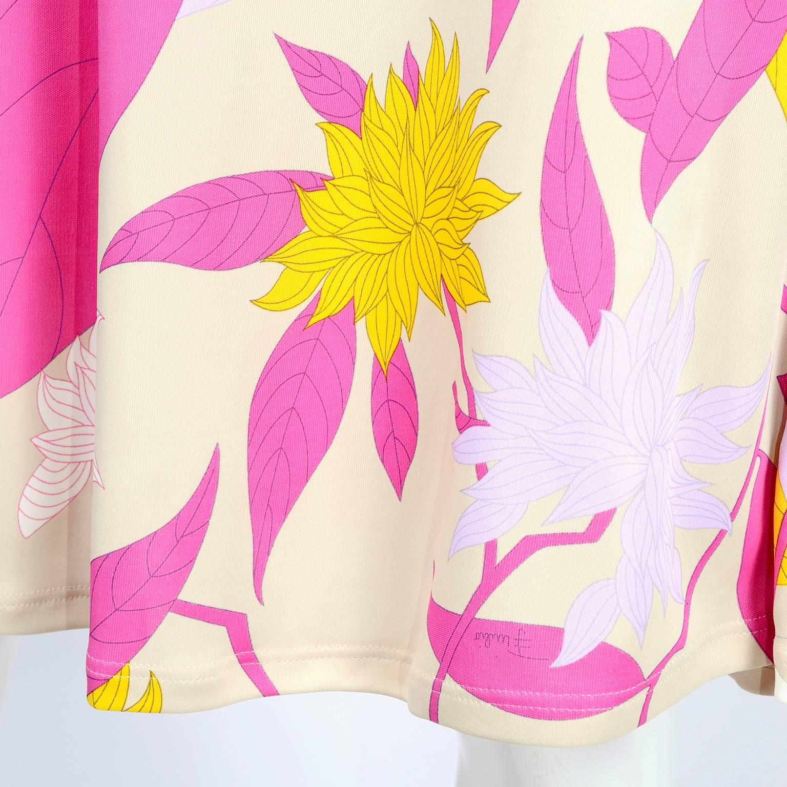 This is a Pucci rayon jersey floral leaf print dress in shades of pink, cream, yellow and lavender.  The dress was designed by Matthew Williamson for Pucci and made in Italy in 2009 and is labeled an Italian size 44, French size 40, US size 10, and