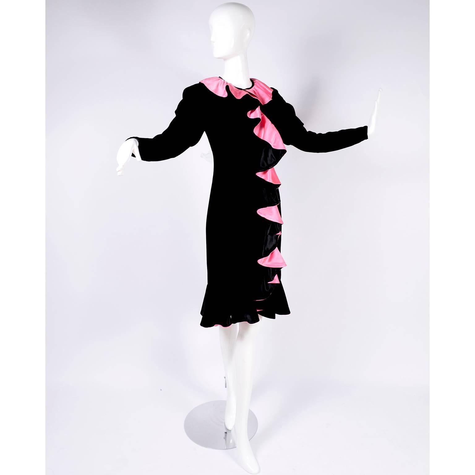 This is such a fun 1980's vintage dress from Oscar de la Renta in black velvet with gorgeous bright pink satin lined ruffles.  We are obsessed with the 80's and this dress is a perfect reason why!  The dress has a somewhat shift style fit, with a