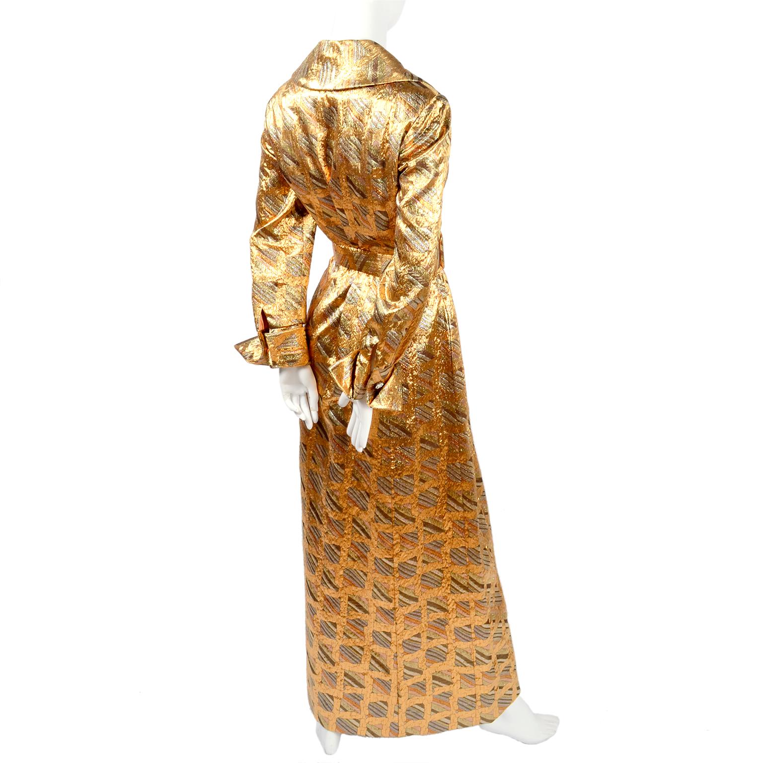 This show stopping metallic dress was made in Hong Kong by Dynasty in the late 1960's or very early 1970's.  The dress has its original matching belt and the 