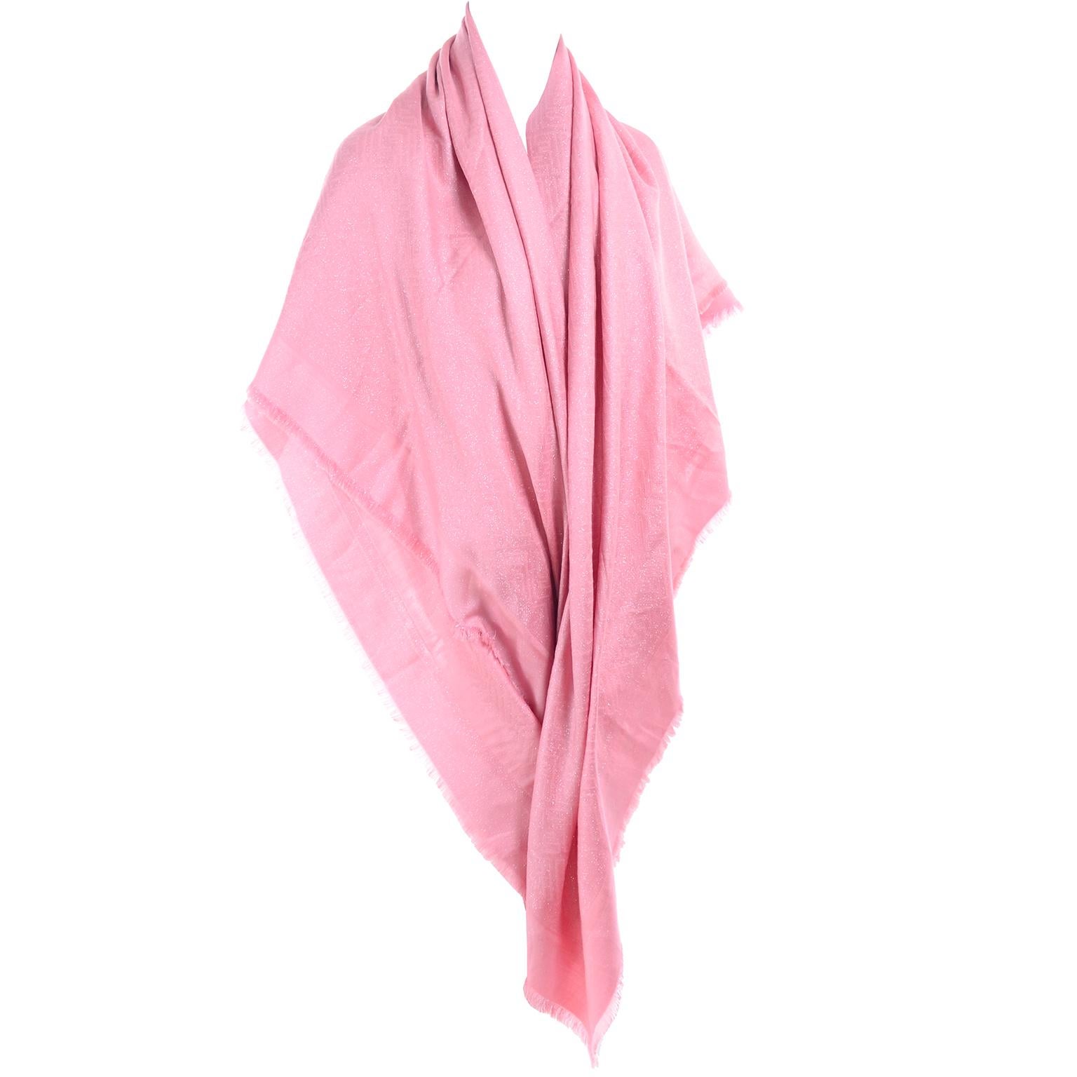 This pink jacquard Fendi scarf would also make a perfect shawl and it was never used! This is a lovely Fendi wrap or scarf that measures 56