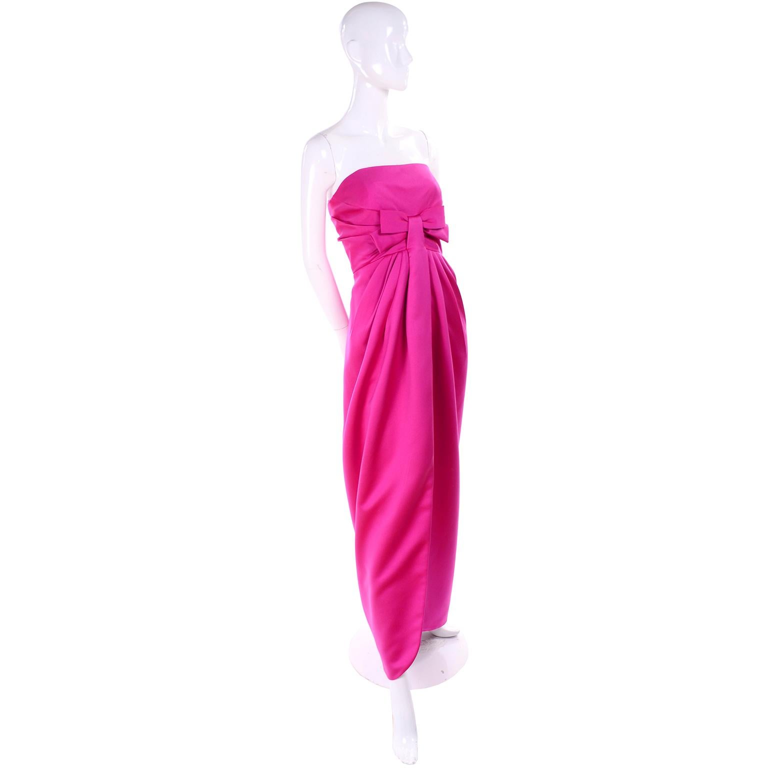 This wonderful vintage pink satin dress was designed by Victor Costa in the late 1980's. This evening gown is in such a wonderful shade of pink and it comes with a long sleeve cropped bolero jacket for those chilly evenings.  The dress is strapless