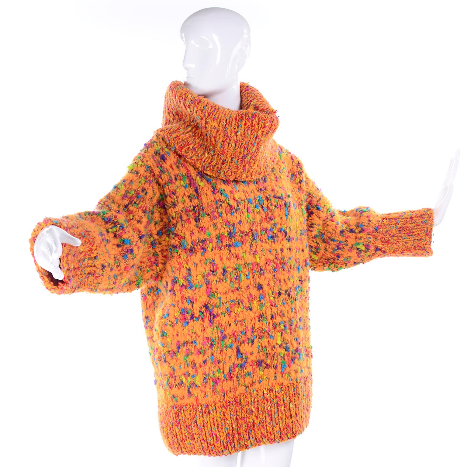 We fell in love with this amazing oversized vintage Anne Klein sweater the minute we found it! This gorgeous nubby wool/rayon/mohair blend turtleneck sweater makes a huge fashion statement and is so lovely in shades of orange, blue, red and yellow.