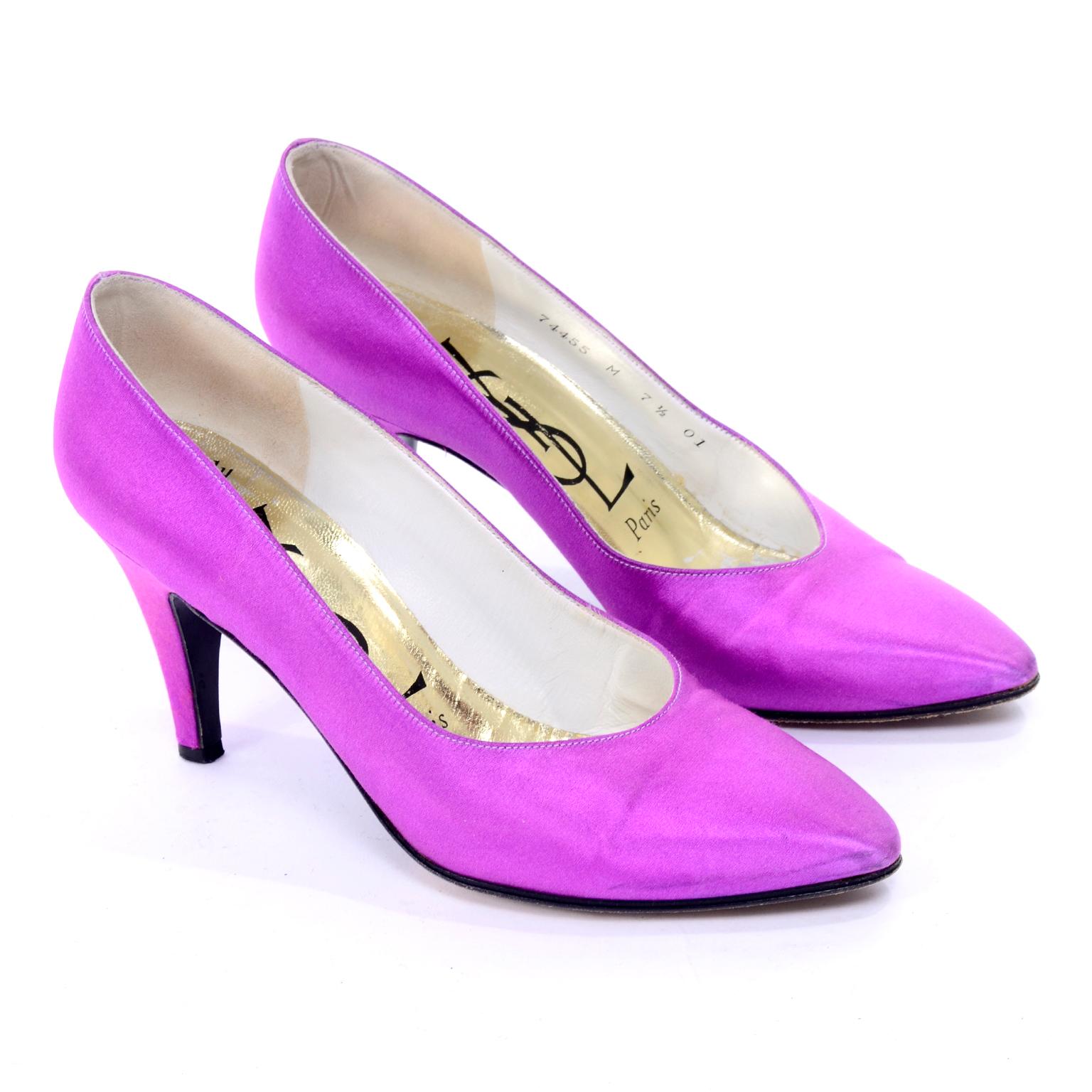 These are very pretty vintage shoes from Yves Saint Laurent. These purple satin YSL pumps have 3 and 1.4