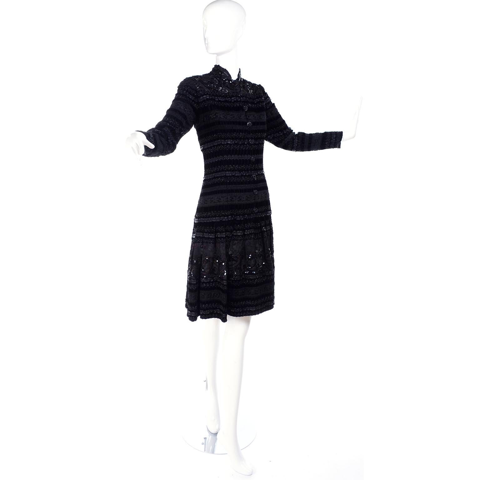 You would have to actually touch this incredible vintage black Emanuel Ungaro dress to appreciate the fine workmanship that went into creating it!  The Unaro Parallele dress is lined and made of horizontal rows of lace and velvet, the lace is
