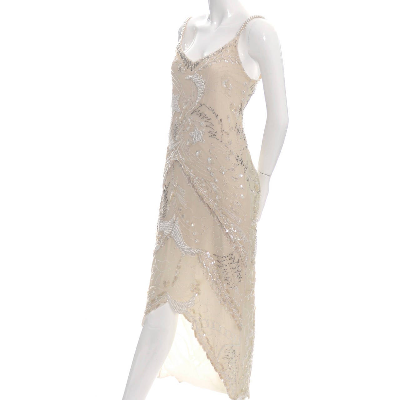 I fell in love with this vintage 1970's Oleg Cassini pale cream silk dress the minute I saw it! The estate had mostly amazing Japanese and Chinese vintage garments for which I was originally contacted, and though I did end up buying many of those,