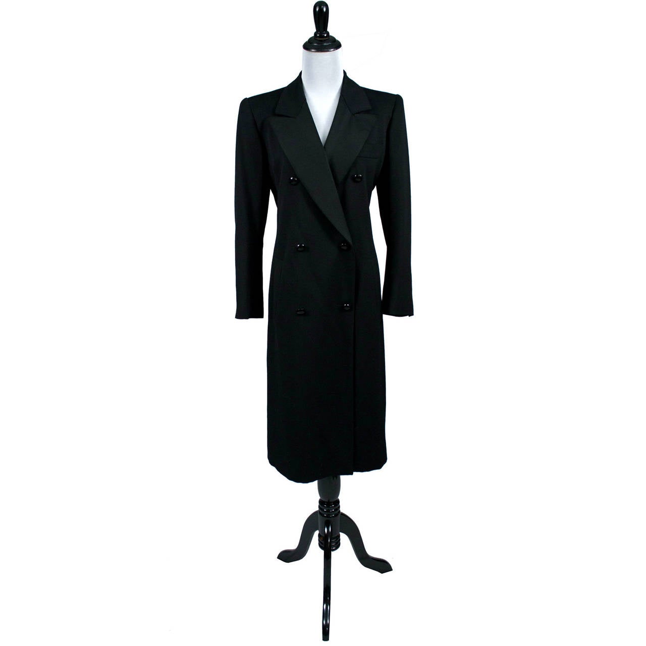 This double breasted tuxedo style 1970s Yves Saint Laurent Rive Gauche designer vintage coat is incredible.. I love the faceted glass buttons, and the coat has a single front lapel pocket and two side slit pockets.  This wonderful  fine wool vintage