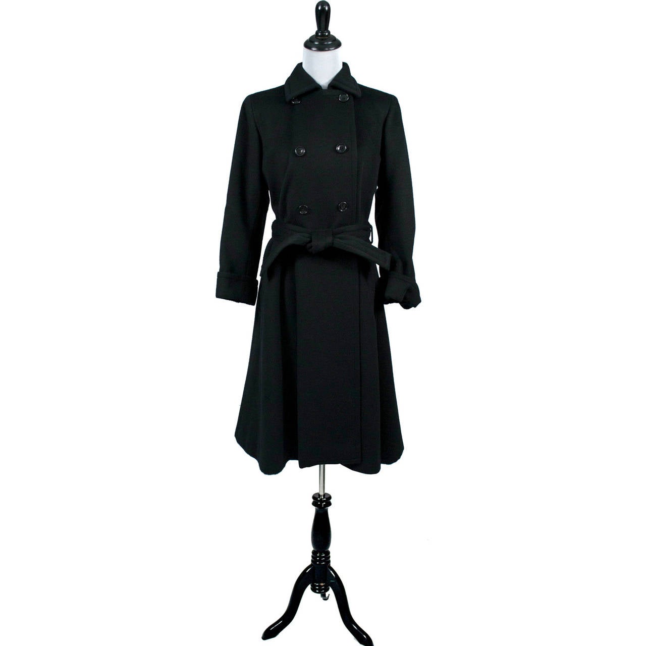 This is a simply stunning, dramatic vintage YSL coat! Yves Saint Laurent Rive Gauche vintage black wool late 1970's trench coat that appears to have never been worn. This coat has an amazing detachable shawl cape and its original matching wool belt.