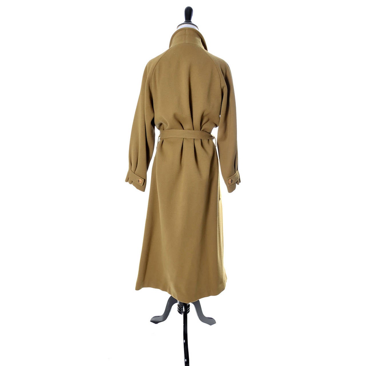 I love this Anne Klein Vintage ribbed wool knit trench coat designed by Donna Karan, who took over as head designer when Anne Klein died in 1974.  This late 70's vintage coat is just an outstanding staple for any winter closet. This coat has dolman