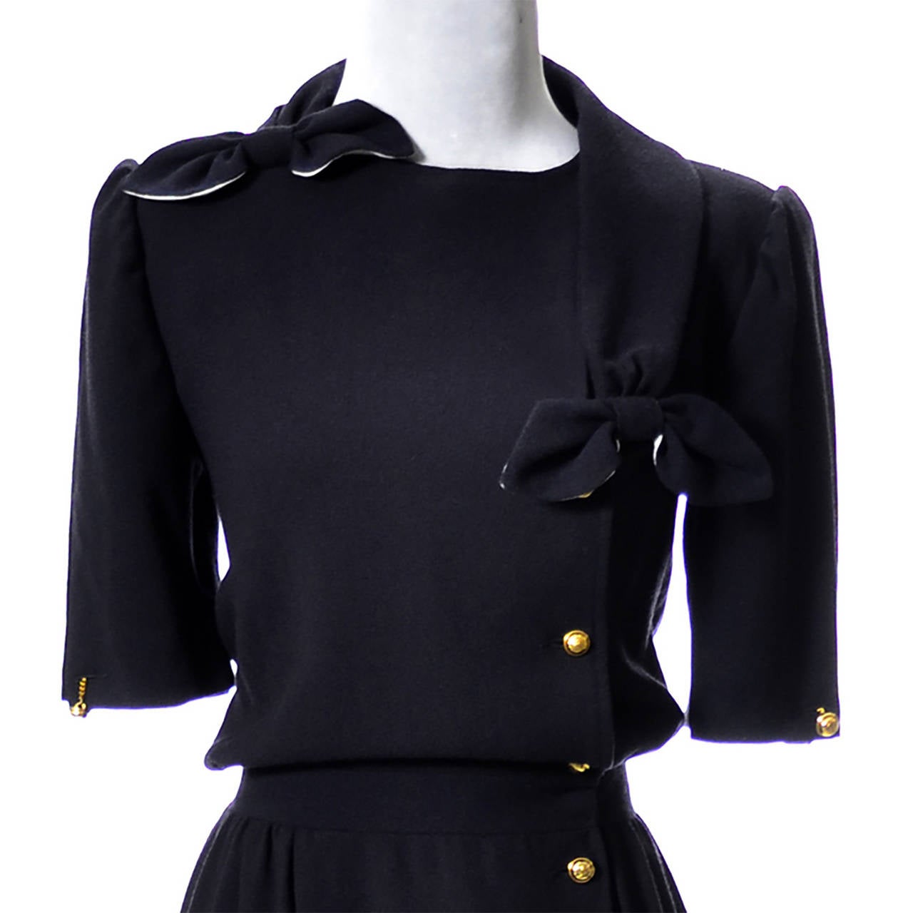 This mint condition Valentino boutique navy blue wool crepe designer vintage dress was made in Italy in the early 1980's.  This dress is in incredible condition and comes from an outstanding estate I acquired that had absolutely beautiful designer