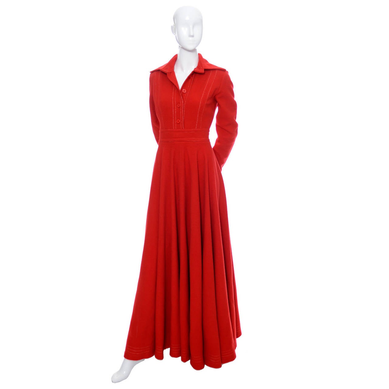 This is a 1970's Vintage Dress from Jean Varon designed by British designer John Bates.  John Bates called his company Jean Varon because he thought the name would be more marketable than his own.  This tomato red dress was made in England in a