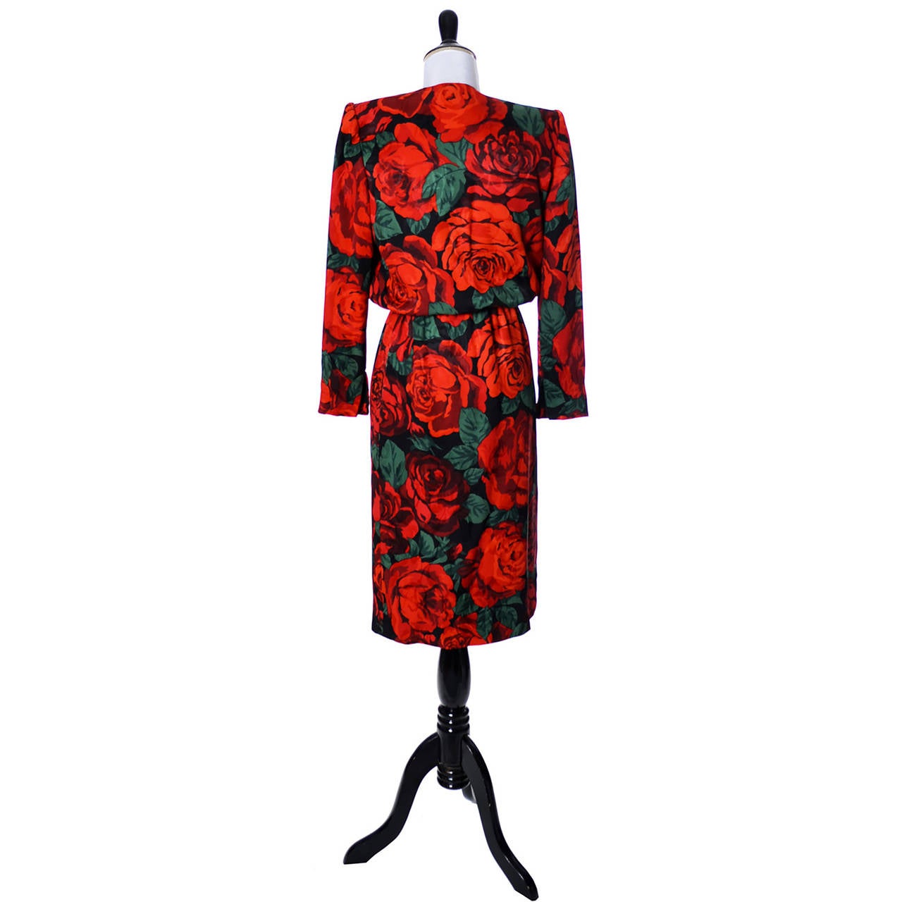 This is a truly gorgeous silk vintage dress from Valentino with beautiful, huge red roses.  This classic dress is so much prettier in person and has a hidden front zipper in the skirt portion, a 