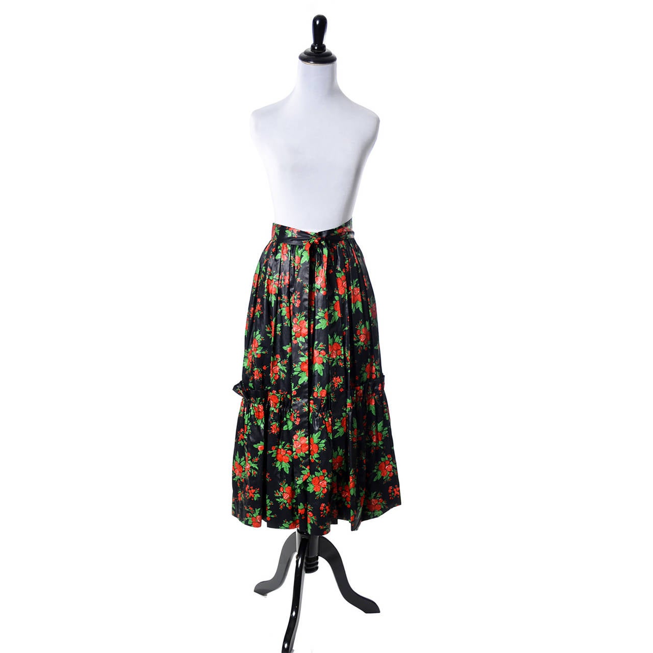 This beautiful polished cotton skirt from YSL was made in France in the 1970s. A wonderful Yves Saint Laurent Rive Gauche ruffled Russian style peasant skirt in a gorgeous floral print.  This collectible YSL vintage skirt has a side zipper, fabric