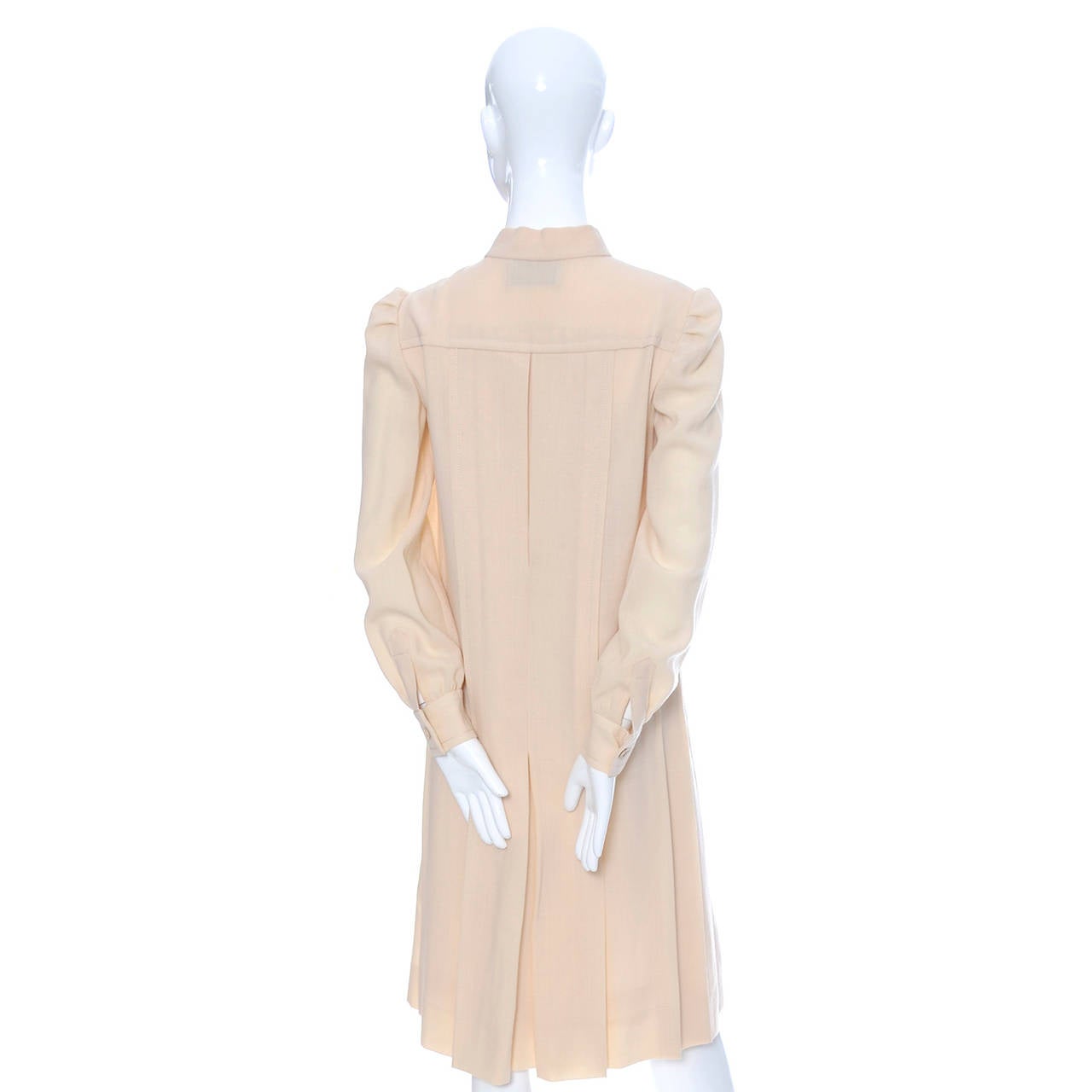This lovely vintage cream wool pleated shift dress was exquisitely made in France in the 1970's for Marshall Field. I acquired several dresses with this label from an estate of high end designer couture and boutique vintage dresses. They are all