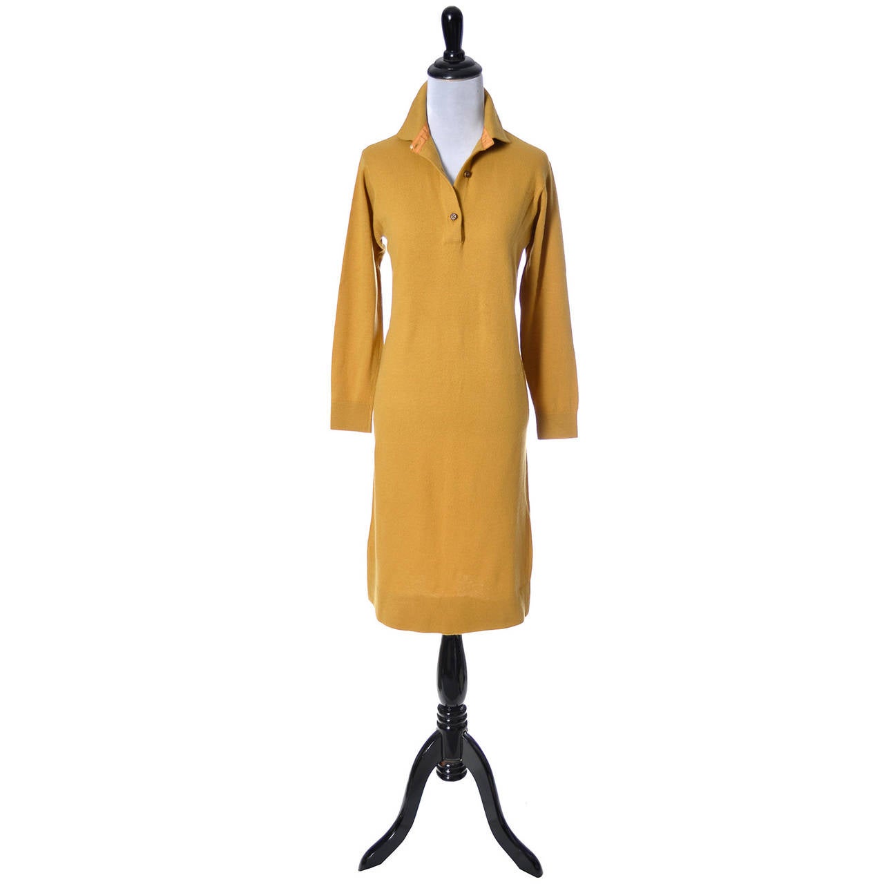 This late 1960's vintage dress is perfect for Fall and Winter, in pure cashmere, and was designed by Bonnie Cashin for Sills. This mustard cashmere sweater dress was made in Scotland, is in mint condition and would make a perfect addition to any