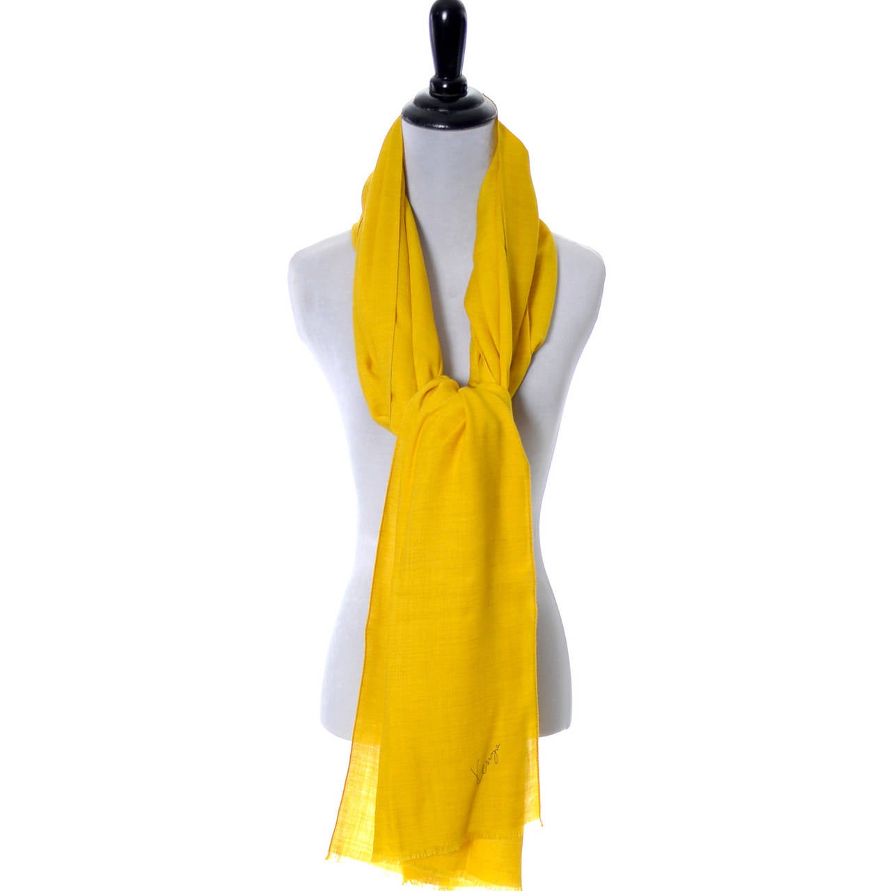 This is a gorgeous mustard yellow vintage scarf from Kenzo Paris with the Kenzo signature logo on the front. This beautiful scarf  is in an ultra fine lightweight wool and can be worn as a shawl - it measures 27 by 80 inches so it's the perfect