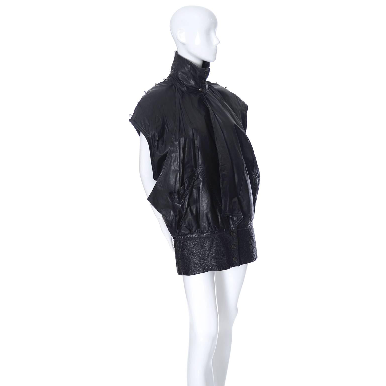 This vintage black sleeveless leather coat, or vintage jacket vest is from Gamma Los Angeles.  This comes from the estate of a fashion lover who had incredible style. Her clothing included many important Japanese designers and the best 1980's
