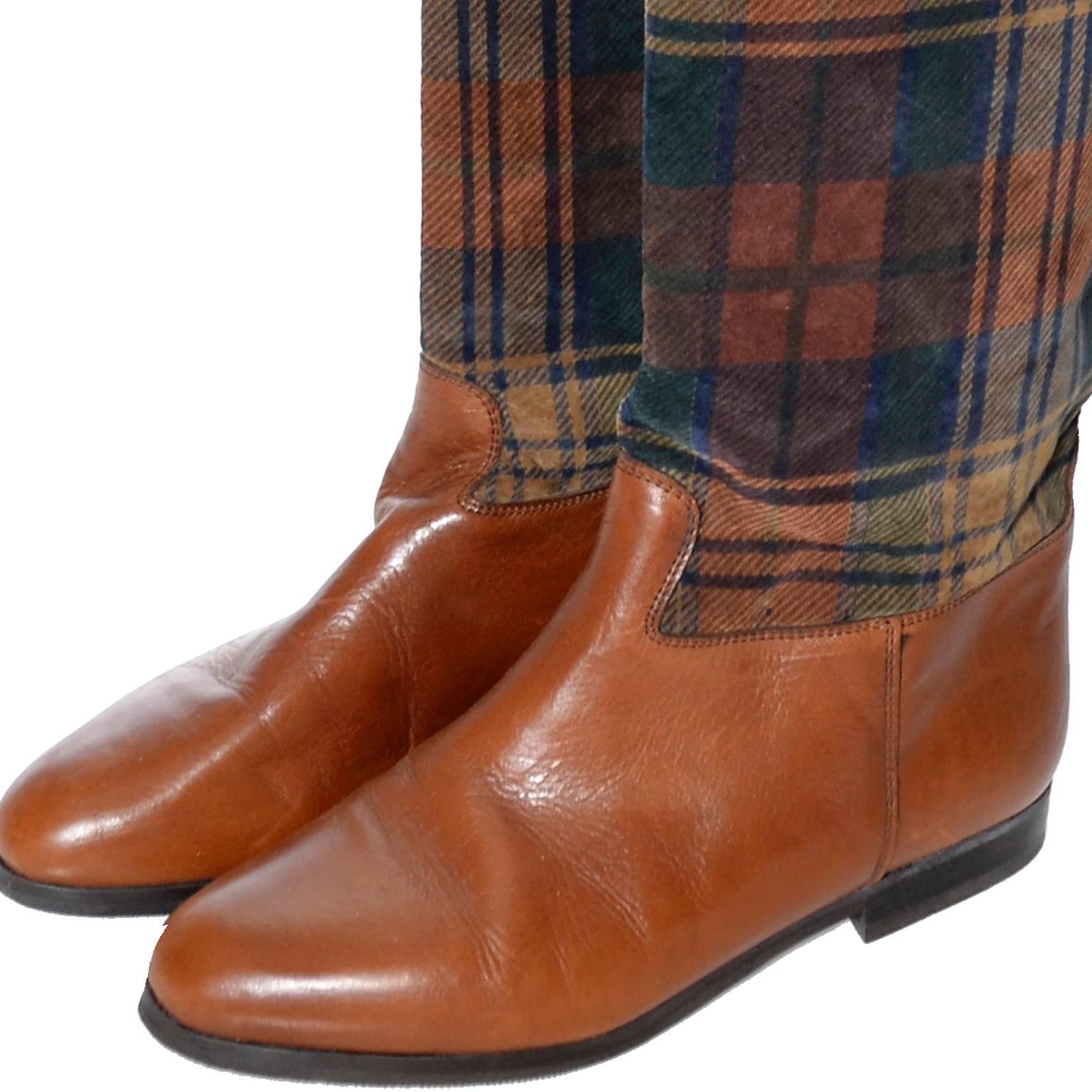These vintage boots are so fabulous! They are from Saks Fifth Avenue and are made of a caramel leather and a soft, plush plaid fabric that is also lined in leather.  These boots appear to have been worn only once and are labeled a size 9B. The other