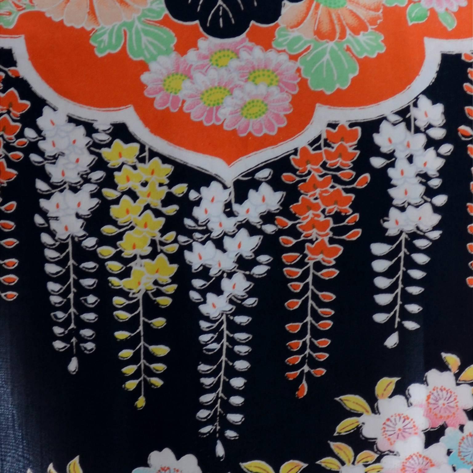 This vintage Japanese silk robe or kimono style jacket is from an estate of Asian antique textiles and fabrics.  The woman who owned this had an incredible collection and I was fortunate to be able to handle the clothing items.  This piece is dark