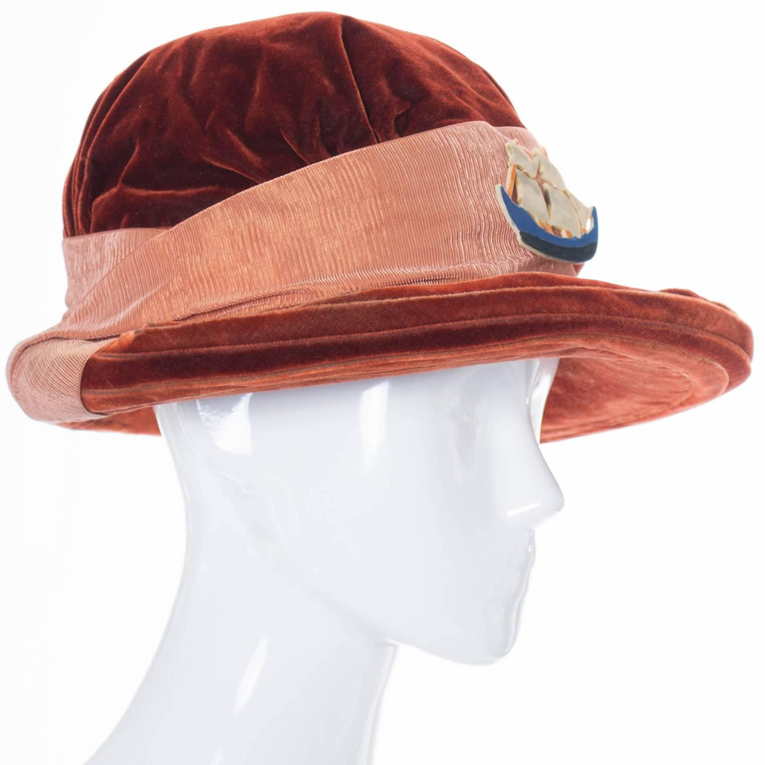 This is a fabulous antique copper velvet vintage hat from the earlier part of the 20th century. Wide brim with silk grosgrain ribbon and an amazing ship! This collectible Edwardian hat has a label that reads; By Regina 