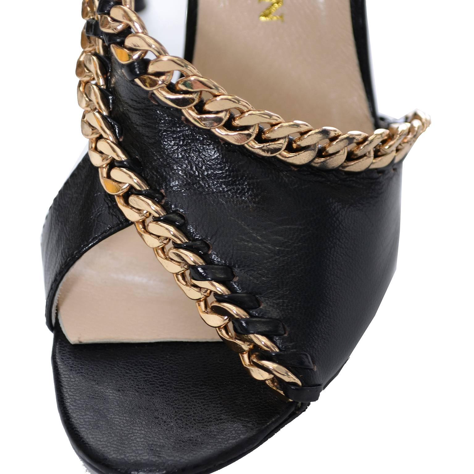 Black leather Balmain shoes with fabulous chunky chain detail designed by Giuseppe Zanotti. These great shoes have 4 and 1/2 inch heels are somewhat narrow - measuring 2 and 7/8 inches on the outside at the widest part of the sole. The shoes appear