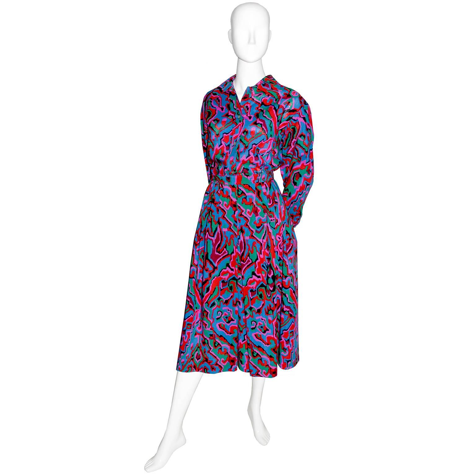 This vintage late 1970's YSL 2 piece dress has a beautiful button front blouse and a skirt with a fitted waistband.  This Saint Laurent Rive Gauche vintage outfit is in a fab multi colored print and the blouse is labeled a size 44, but please use