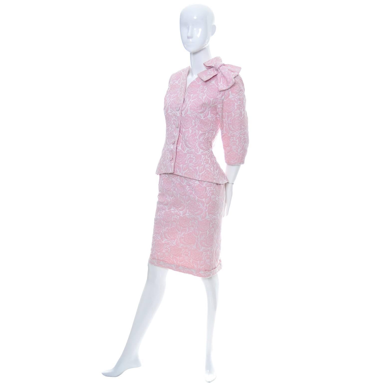 This is a lovely pink floral jacquard skirt suit from designer Guy Laroche. This suit belonged to an East coast socialite who had quite a bit of Guy Laroche in her extensive designer wardrobe.  This suit is lined and has the Guy Laroche Boutique