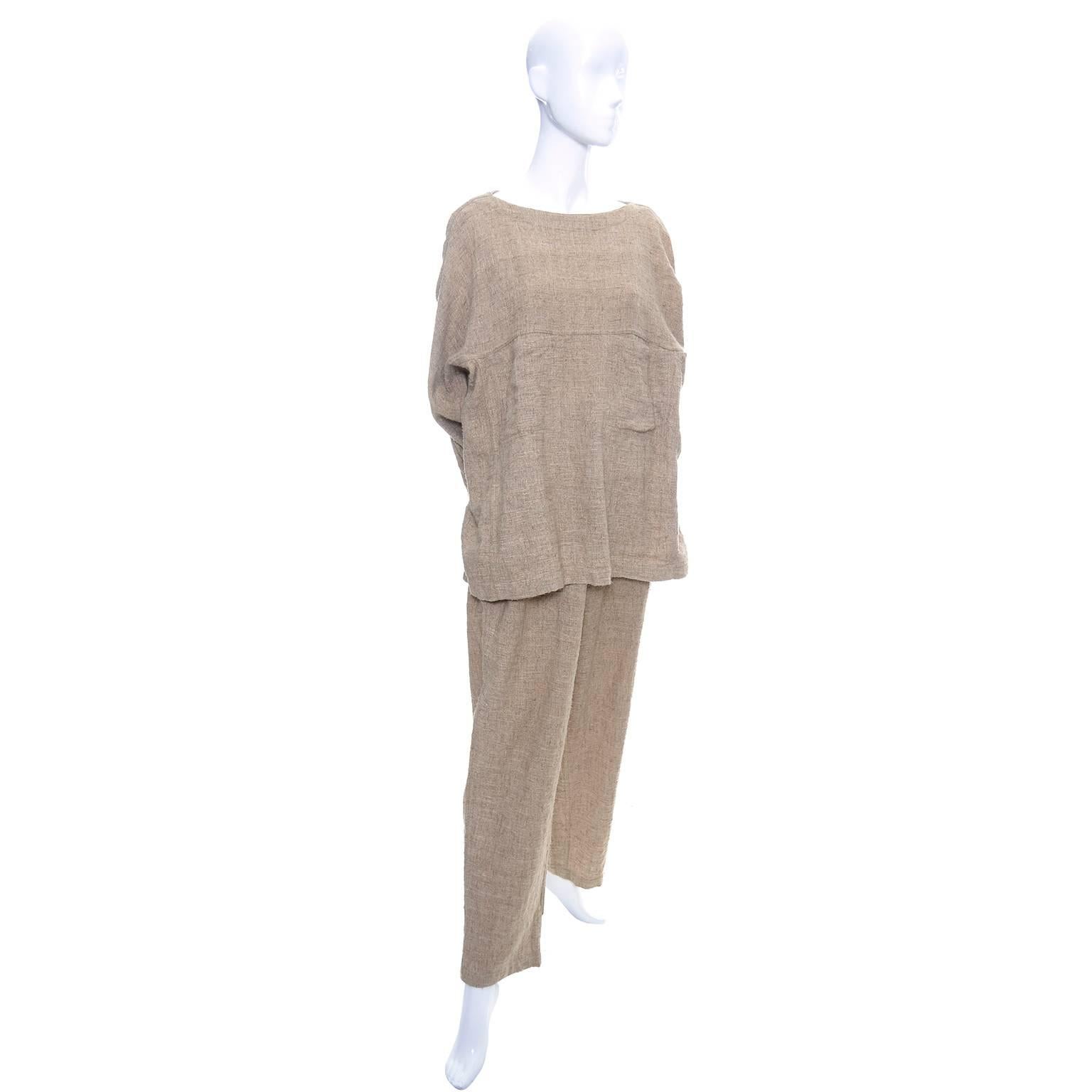 This 2 piece vintage outfit is from the Issey Miyake plantation line and is 100% cotton and was made in Hong Kong in the 1980's.  The textured cotton feels almost like a rough linen and the outfit has high waisted pants with elastic waistband and