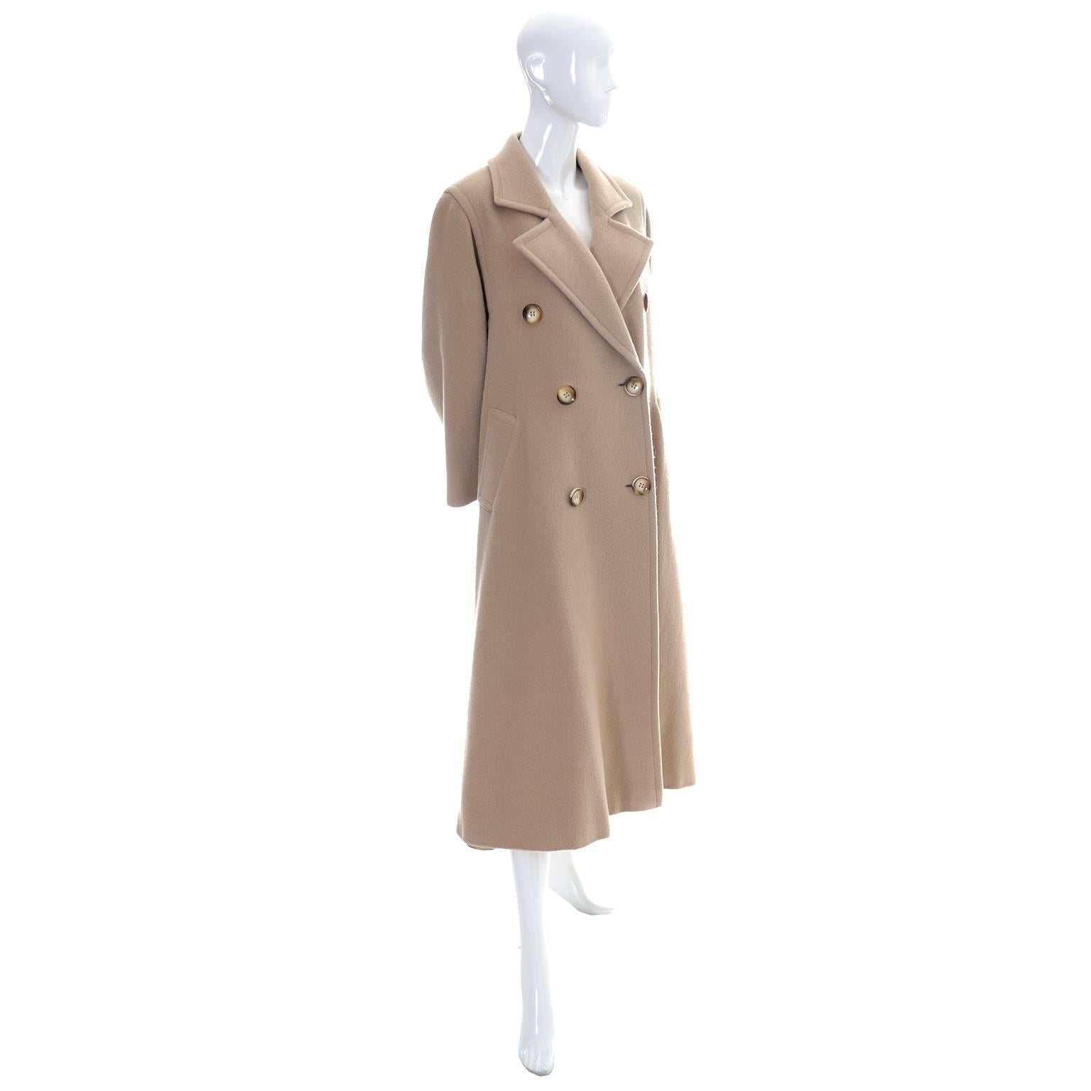 This beautiful vintage coat is from Valentino and has the Miss V label and is in excellent condition.  The coat is also labeled a size 38 (4). This coat is fully lined and is made of 50% Mohair, 30% Wool and 20% Polyamide.  There are side slit