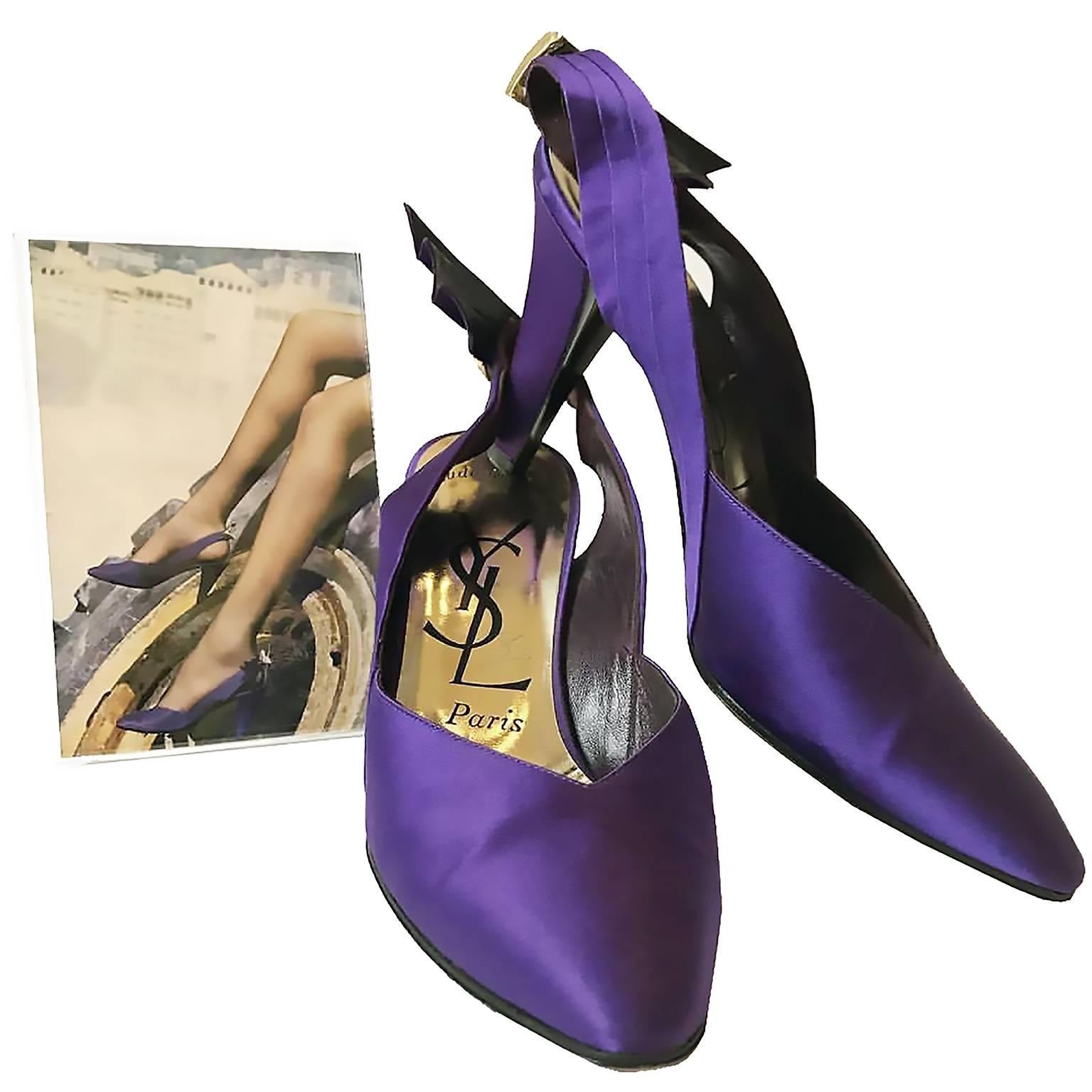 These fabulous documented vintage purple satin YSL shoes have pretty rhinestone buckles and a 