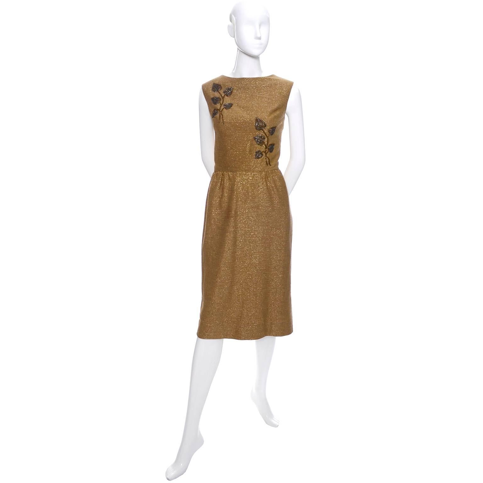 This is a stunning vintage sleeveless gold cocktail dress with beautiful beading by Carlye from the 1960's. The fabulous cocktail dress is approximately a modern day US size 8, but please press "continue reading" below the description to
