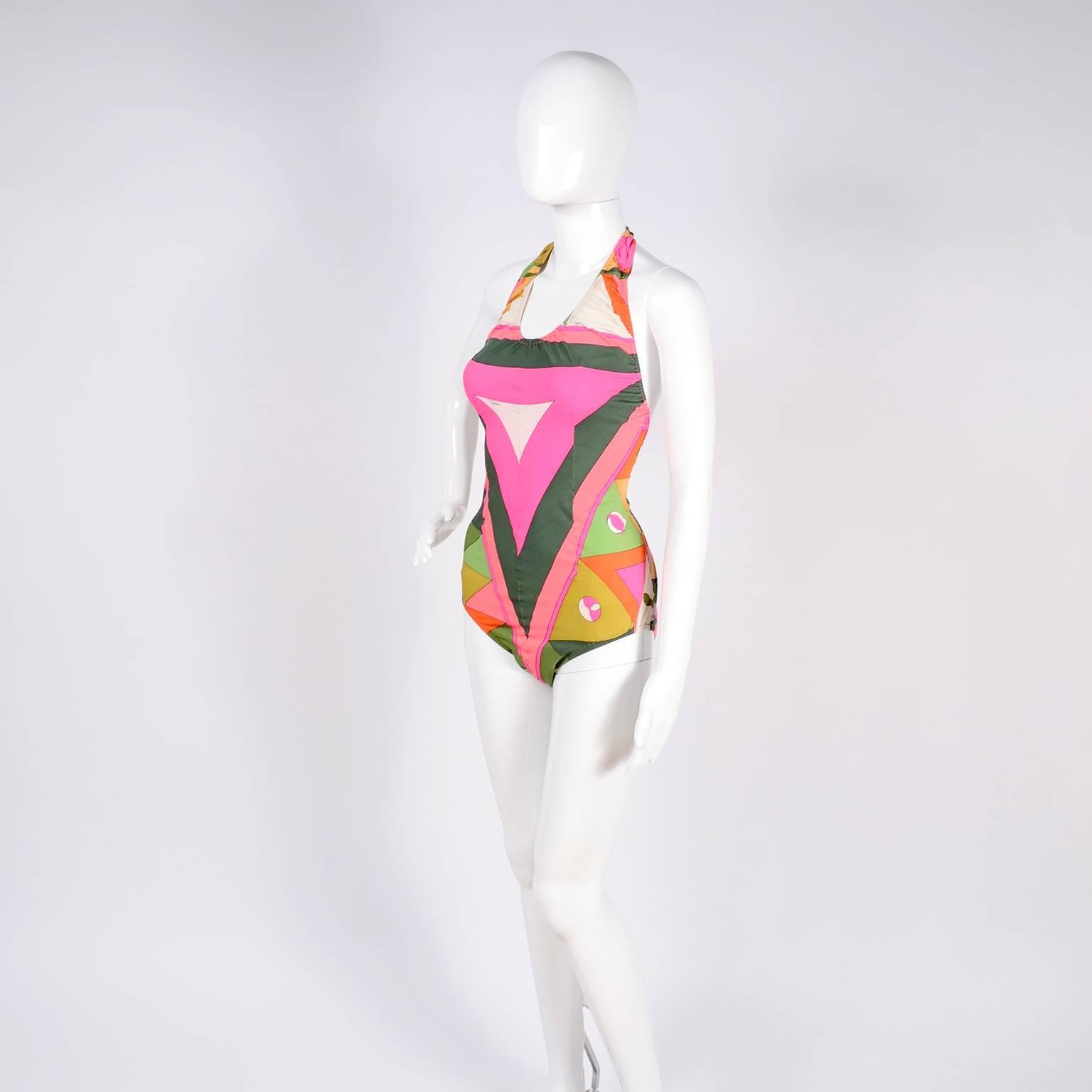 This is a fabulous vintage Pucci swimsuit from the late 1960's.  The suit fits a size Medium and has the Emilio Pucci signature print and the Emilio Pucci Florence - Italy label as well as the Exclusively for Saks Fifth Avenue Italy label.  The suit