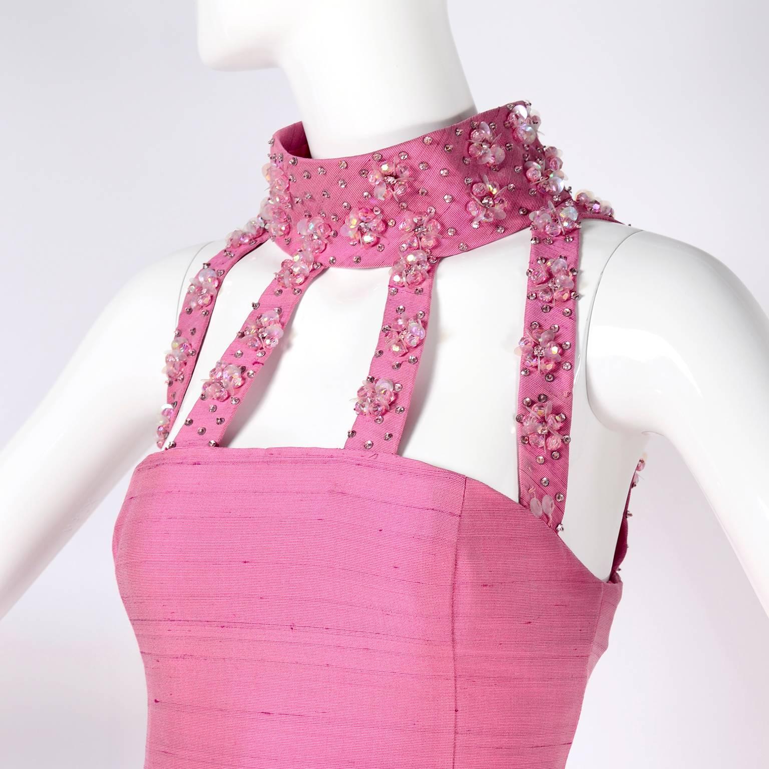 This is a stunning pink  vintage evening gown from Pierre Cardin.  The dress was originally purchased in the late 1960's and is easy to see how this dress could have easily been an inspiration for other designers including Gianni Versace and many of