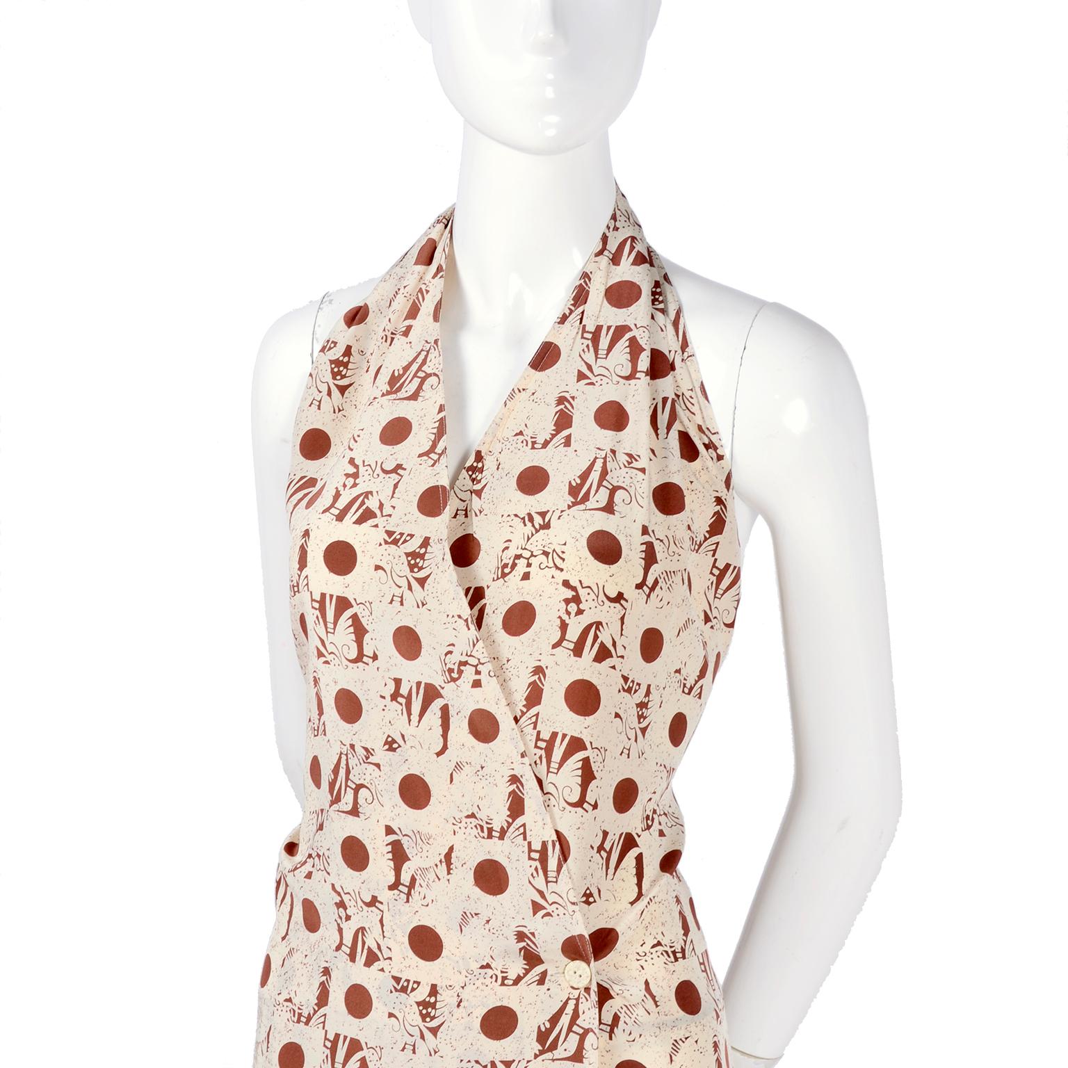 This fabulous, very contemporary vintage Albert Nipon halter dress is in an abstract brown and cream printed silk fabric and comes with a silk open front, loose fitting blouse style jacket for cooler nights.  The dress is loose fitting, has side