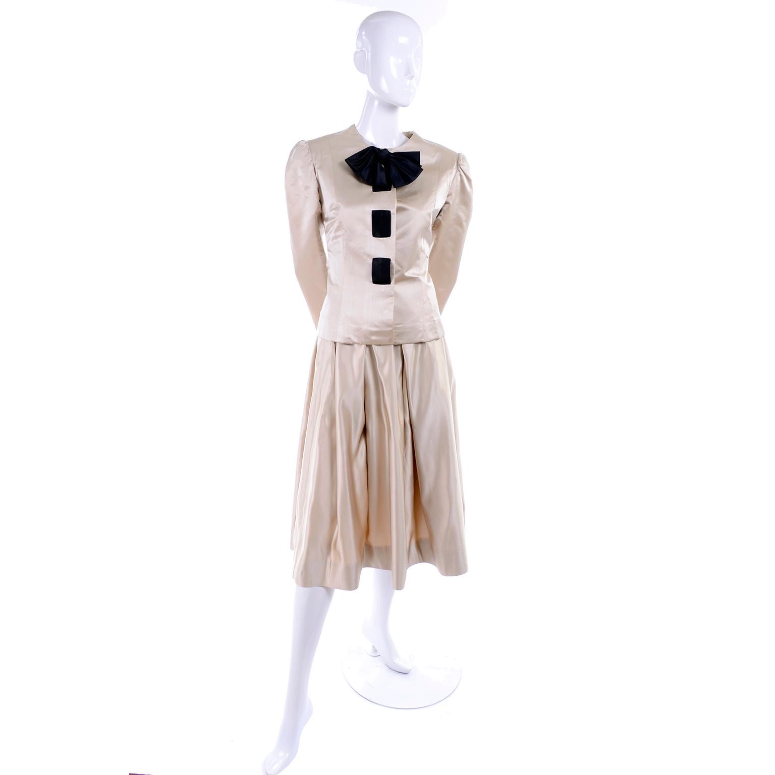 This lovely 2 piece dress or suit is from Albert Nipon and we think it's fabulous! We have developed such a new appreciation for Albert Nipon and have been searching for his earlier pieces! This beautiful ensemble is in a neutral fawn beige silk and