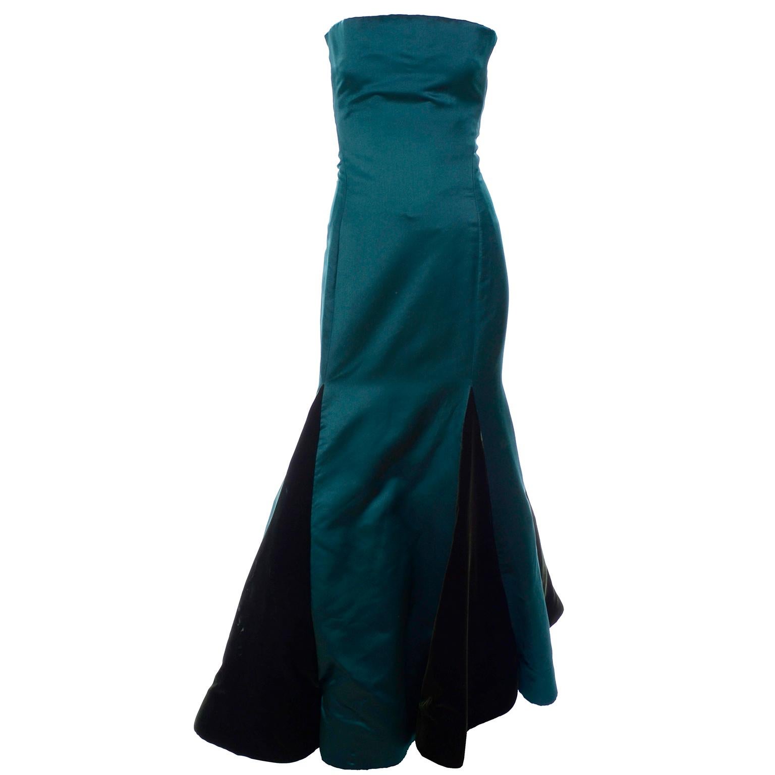 This incredible vintage green dress was designed by the incomparable Arnold Scaasi.  This stunning evening gown is strapless with a gorgeous uniquely cut bodice and a trumpet skirt that has alternating rows of velvet and satin. The dress is fully
