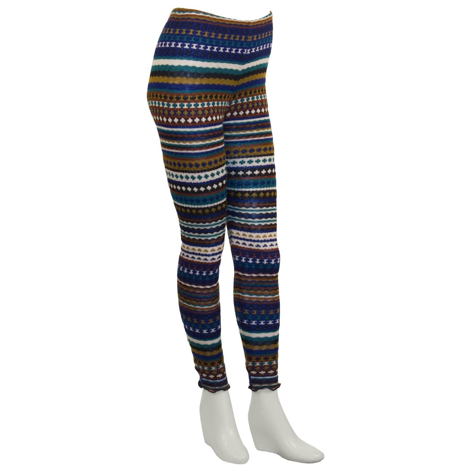 Adorable and cozy Missoni knit leggings from the 1980's featuring iconic stripes and zig zag lines in colors blue, green, mustard, brown, white and navy. Elasticized waist and a serge finished hem. Excellent vintage condition. Fits like a US 2.