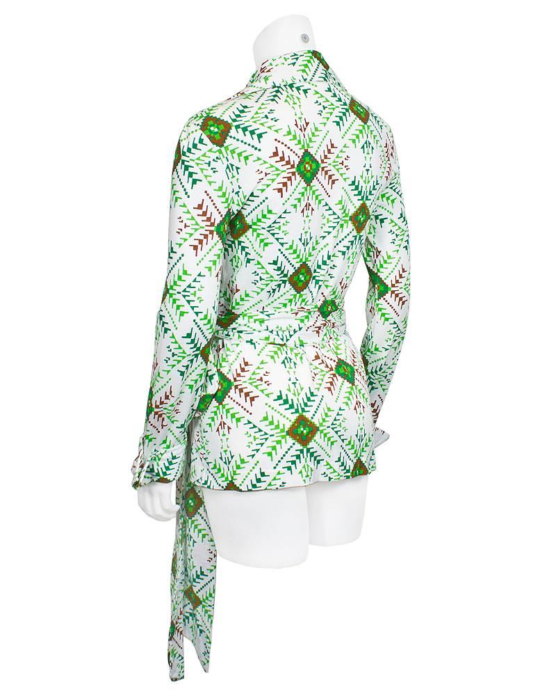 Original edition 1970's DVF wrap top in cotton with geometric print. This classic icon of fashion was more commonly found in the dress form however the popularity of the wrap shape allowed it to be interpreted in many ways. In very good vintage